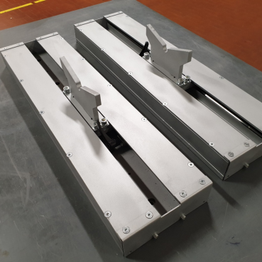 Supporti mobili e guide protette per schizzi di saldatura